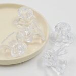 CAIREL CAMPANITA ACRILICO FACETADO PASANTE 40*30MM. 
X 500 GRS.