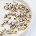 CARACOLITOS COLGANTES ACRILICO 25*10MM X 12 UNIDADES (EMC 19-11)