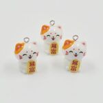 DIJE GATITO RESINA CON GANCHO FRASE DE REPENTE RICO 2.5*1.5MM X 12 UNIDADES (EMC 7-1) 3