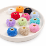 POMPOM SURTIDO PIEL DE CONEJO IMITACIÓN /16*12MM AGUJERO INTERNO 0.71MM X 12 UNIDADES (EMC 23-2)