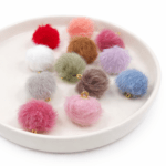 POMPOM SURTIDO PIEL DE CONEJO IMITACIÓN /16MM COLGANTE X 12 UNIDADES (EMC 23-3)