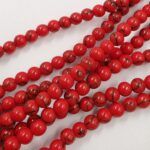 PIEDRA NATURAL HOWLITA ROJA BOLITA 6MM X UNA TIRA 38 CM.(EMC 25-21-2) - Imagen 2