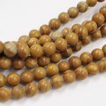 PIEDRA NATURAL JASPE MADERA BOLITA 6MM  X UNA TIRA 38 CM.
(EMC 25-19-2) - Imagen 2