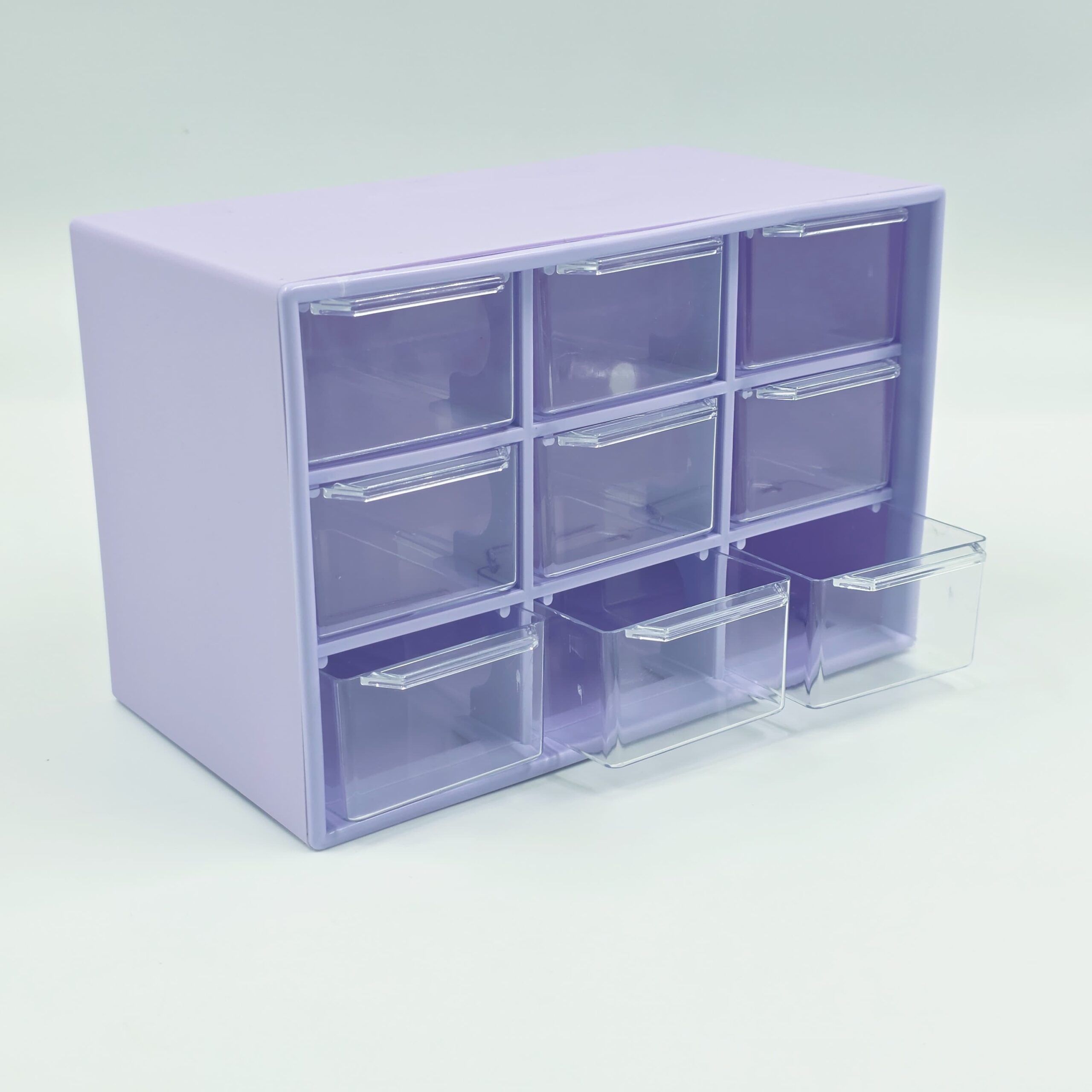 509d4d0a-407d-4e36-83b8-43b0ee0b3281-2 CAJA ORGANIZADORA PLASTICA LAVANDA/ 9 CAJONES ACRILICO (EMC 3-2) - Imagen 1