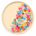 PACK X 100 G CORAZON 8*10MM PASANTES SURTIDOS (EMC 47-12)